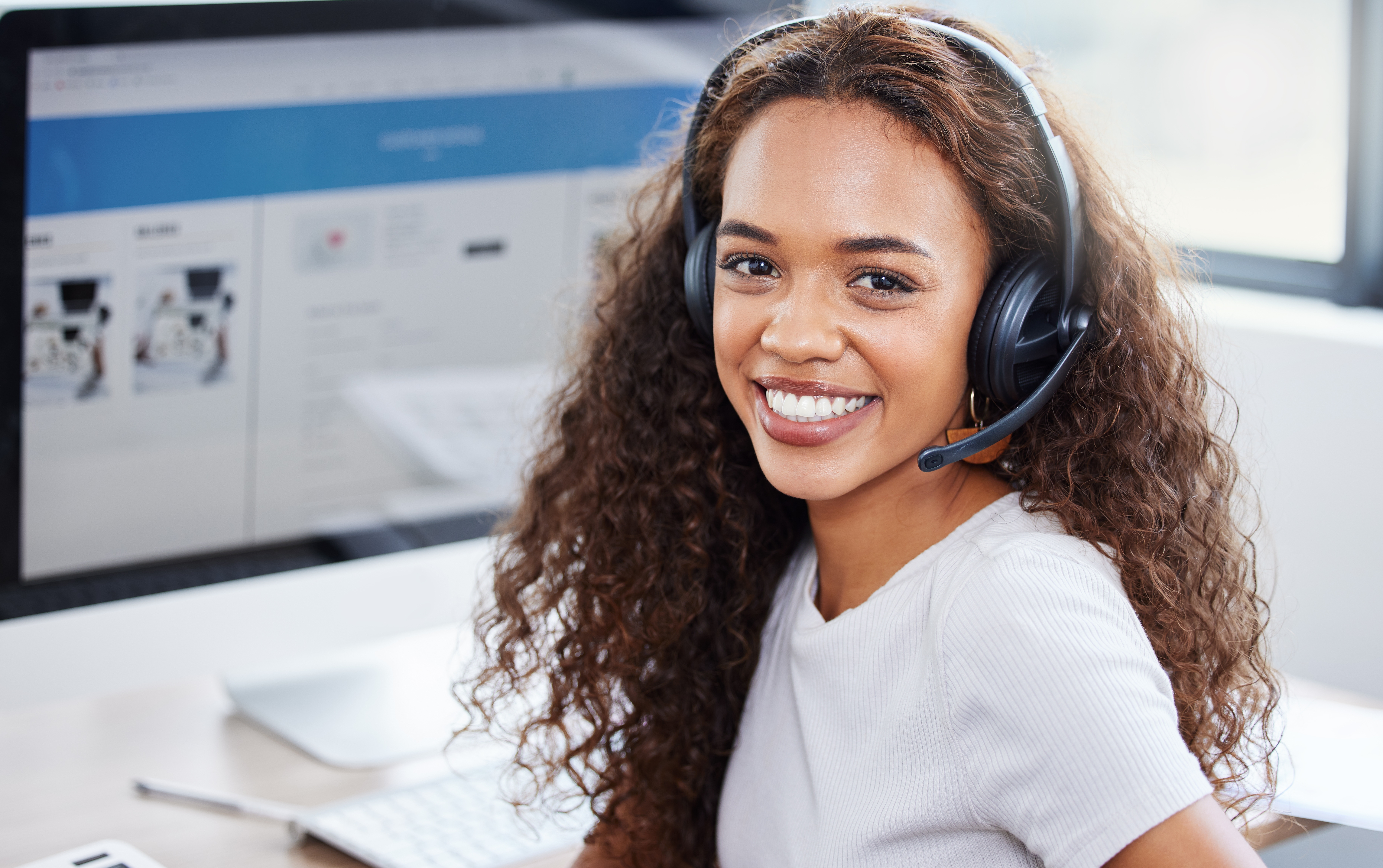 Happy,,Portrait,And,Woman,In,Call,Center,With,Computer,Screen,